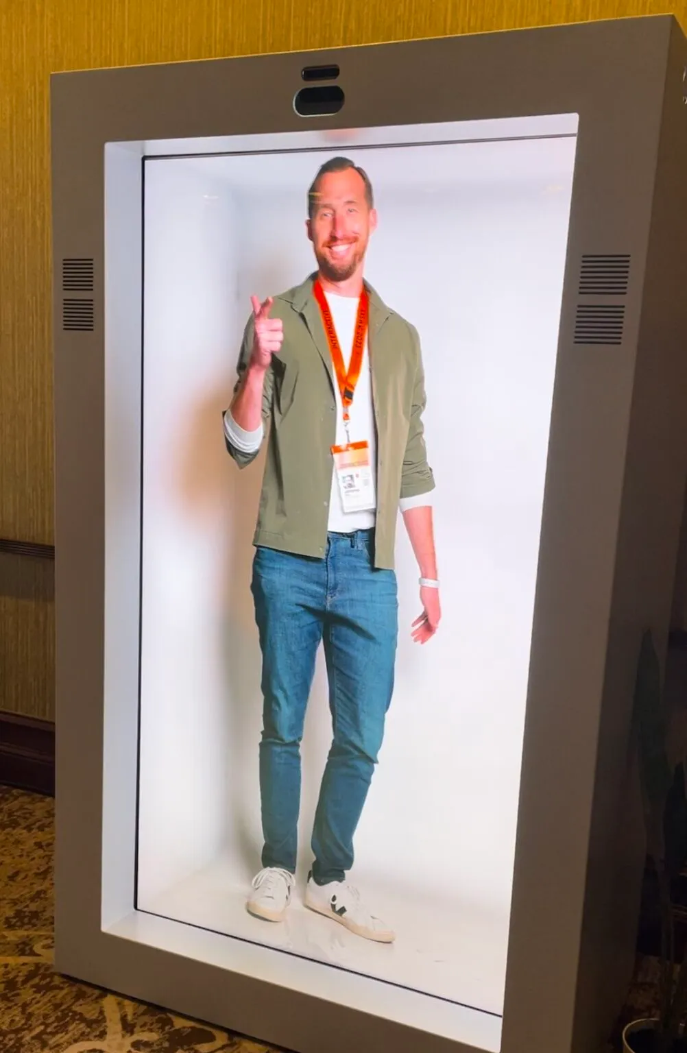 A full-length image of Jeremy on a vertical display at SXSW